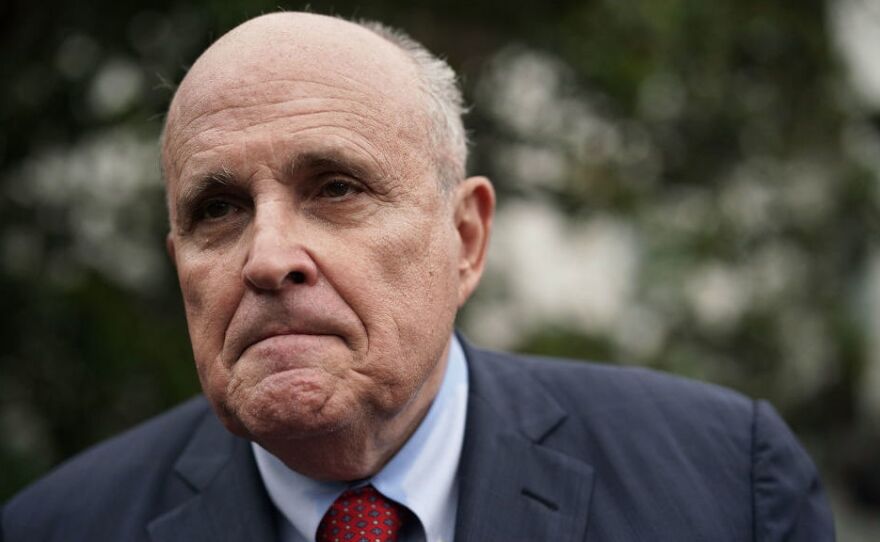 Rudy Giuliani, former New York City mayor and current lawyer for President Trump, speaks to members of the media during a White House Sports and Fitness Day last month. Giuliani suggested Friday that presidential pardons could be given to people caught up in the Mueller investigation.