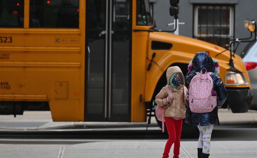 Children arrive for class in the Brooklyn borough of New York City.