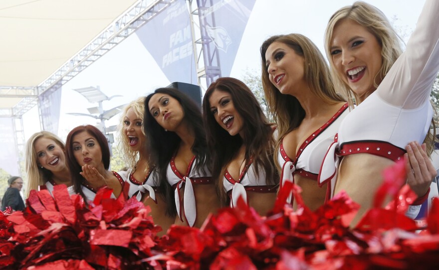 Arizona Cardinal cheerleaders have some fun before the NFL Super Bowl XLIX football game.
