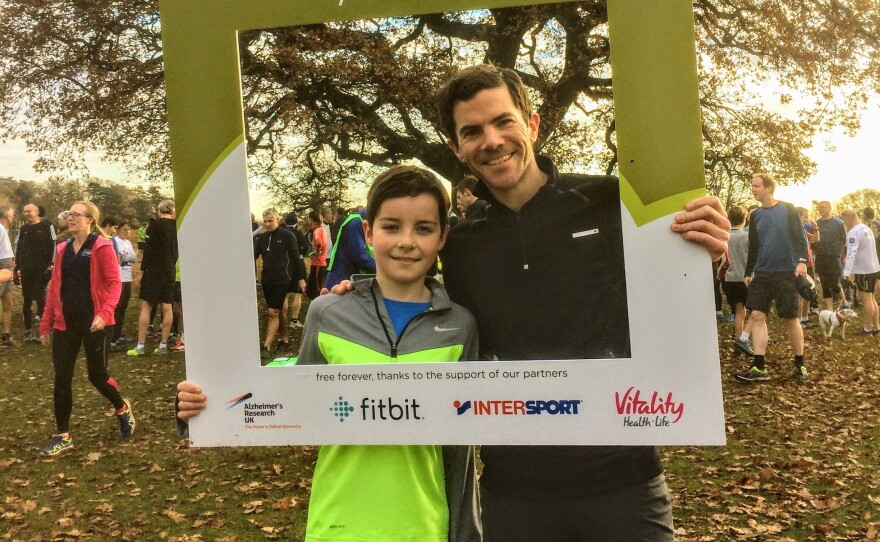 Owen Delaney with his son Tom, during a run in London's Bushy Park.