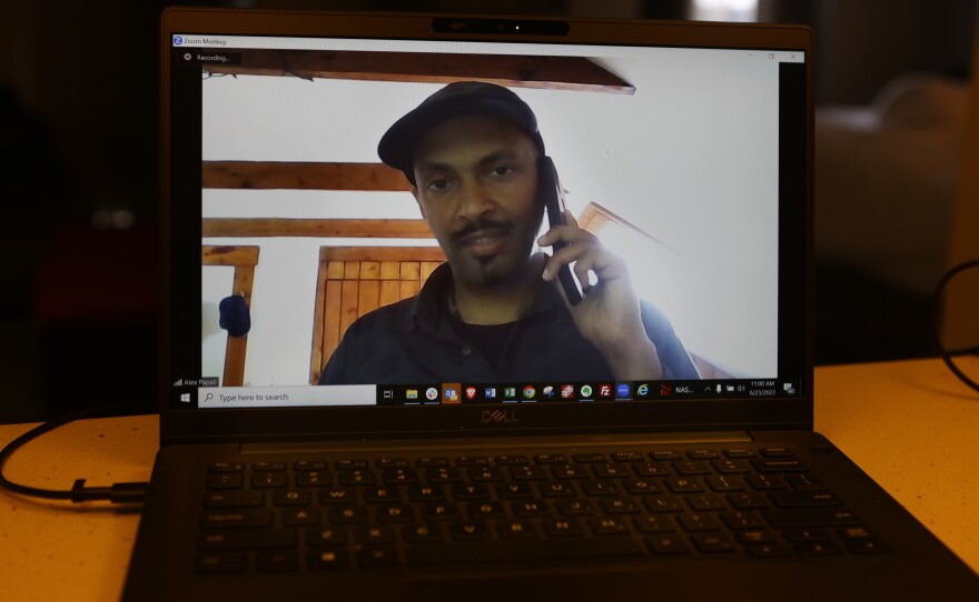 Alex Papali, an activist who has been accused of domestic terrorism, talks via zoom because they are not allowed back in the state after being threatened with domestic terrorism charges for protesting the Atlanta Public Safety Training Center that protesters refer to as "Cop City" in Atlanta, Georgia, U.S., June 23, 2023.