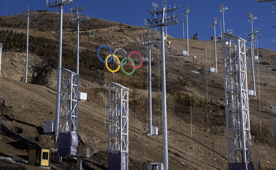 The Olympic logo is seen on a hillside at Zhangjiakou Genting Snow Park in Zhangjiakou in northern China's Hebei Province, Saturday, Nov. 27, 2021. The venue will host the freestyle skiing and snowboard competitions at the upcoming 2022 Beijing Winter Olympics.