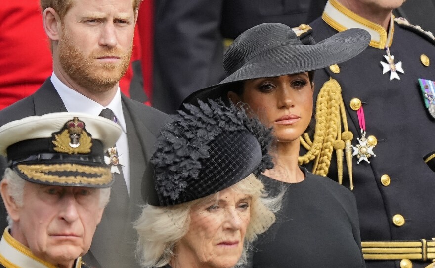 Britain's King Charles III, from bottom left, Camilla, the-then Queen Consort, Prince Harry and Meghan, Duchess of Sussex attend the state funeral service of Queen Elizabeth II in Westminster Abbey, London, on Sept. 19, 2022.