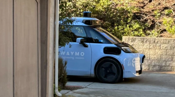 A Waymo vehicle drives down the street in the South Park neighborhood of San Diego on Jan. 16, 2026.