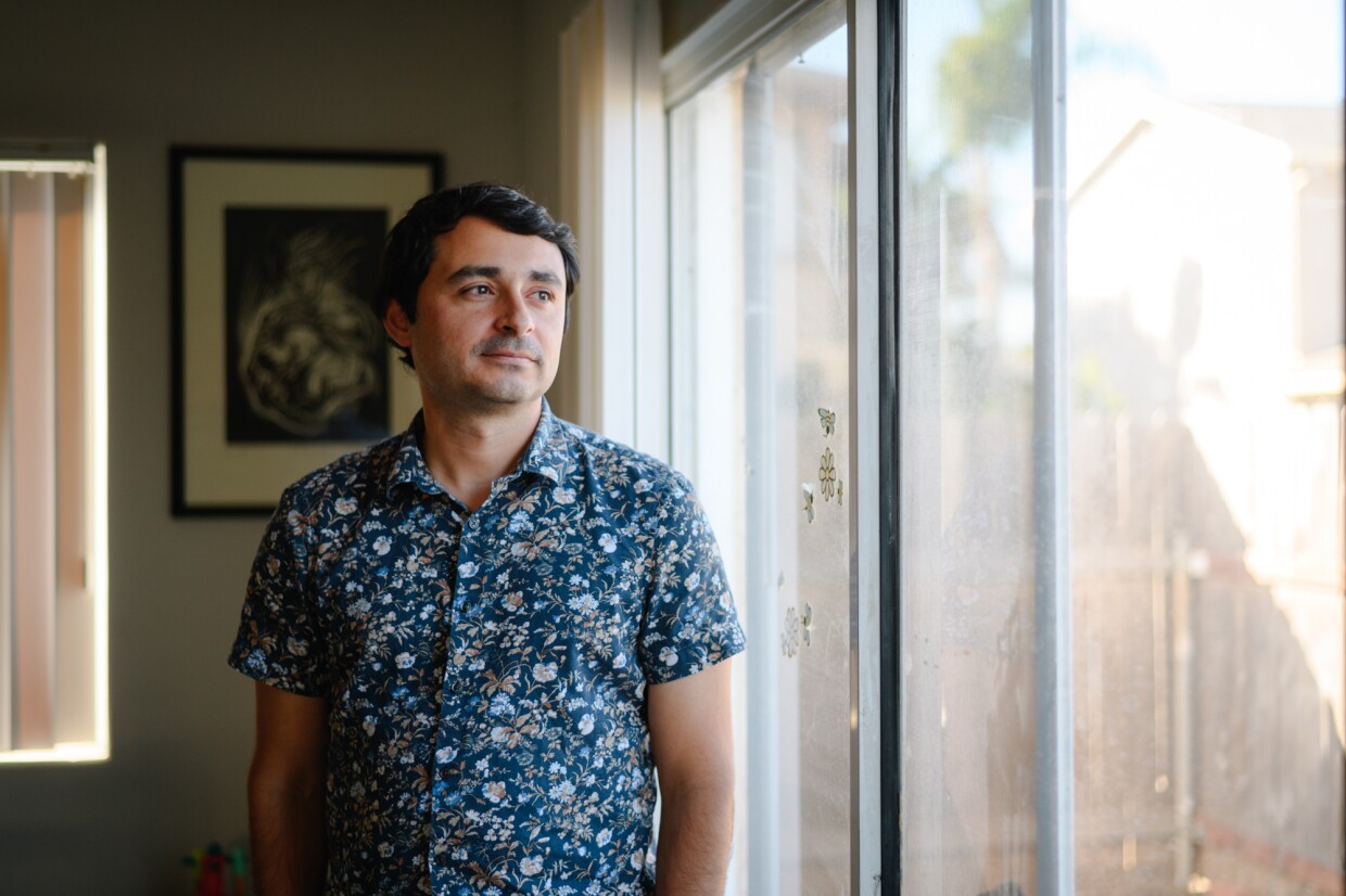 Jose Lopez, San Diego director of the Alliance of Californians for Community Empowerment, stands for a portrait at his home in Imperial Beach, California on November 18, 2024. Lopez is working with dozens of renters to push for a local tenant protection ordinance.