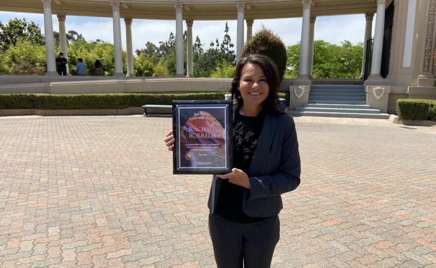 Rachael Borrelli after accepting an award in 2022 when she was a volunteer coordinator at the Department of Animal Services.