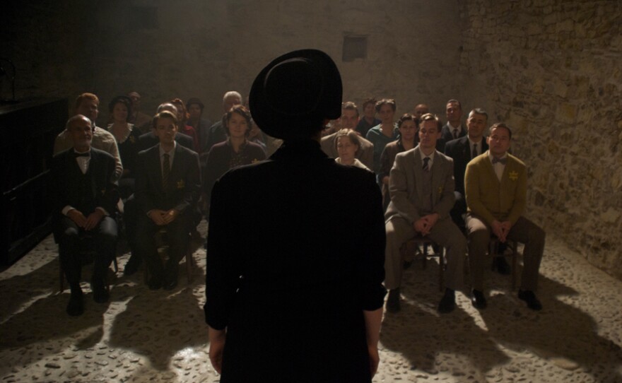 Re-enactment of a small underground concert in Terezin concentration camp.