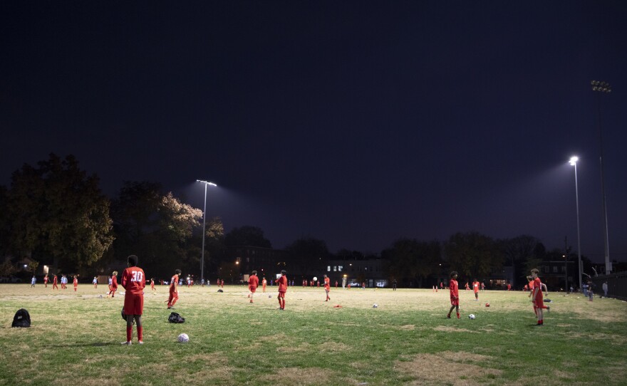 Fifteen- and 16-year-olds from DCXI soccer team practice together.