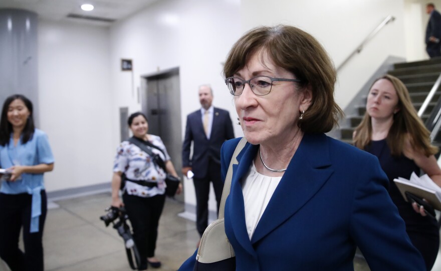Sen. Susan Collins, R-Maine, walks on Capitol Hill on Wednesday. A key vote on Brett Kavanaugh's Supreme Court nomination, she said Thursday that the FBI investigation seemed "very thorough."