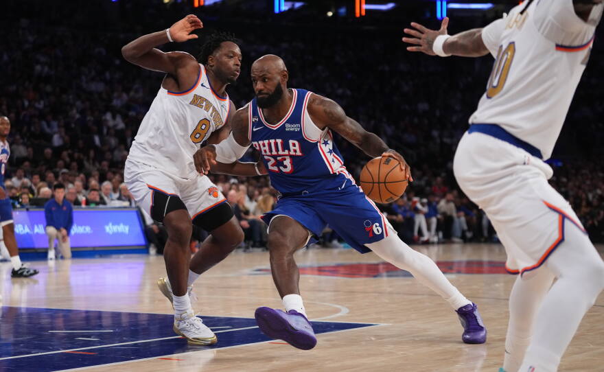 Philadelphia 76ers forward LeBron James (23) drives against New York Knicks forward Og Anunoby during the second half of an NBA basketball game Tuesday, Oct. 20, 2026, in New York.