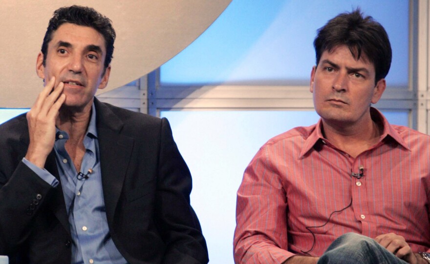 Chuck Lorre, left, executive producer of CBS' "Two and Half Men," at a 2005 press conference with then-co-star Charlie Sheen.