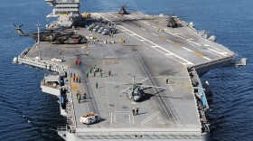 The Nimitz-class aircraft carrier USS Carl Vinson (CVN 70) awaits the return of Carrier Air Wing (CAG) 17 aircraft along the coast of Haiti. Carl Vinson and Carrier Air Wing (CVW) 17 arrives on January 15, 2009 in Port-Au-Prince, Haiti.  /U.S. Navy via Getty Images)