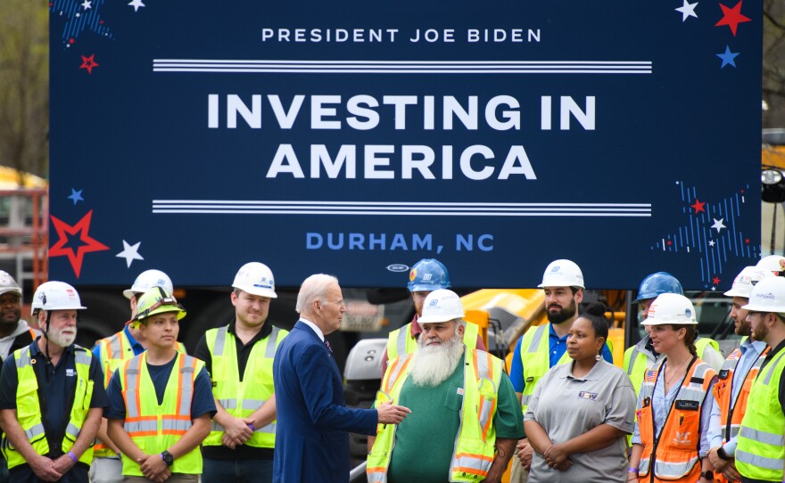 President Biden greets workers after a visit to Wolfspeed, a semiconductor manufacturer in Durham, N.C., on March 28, 2023.