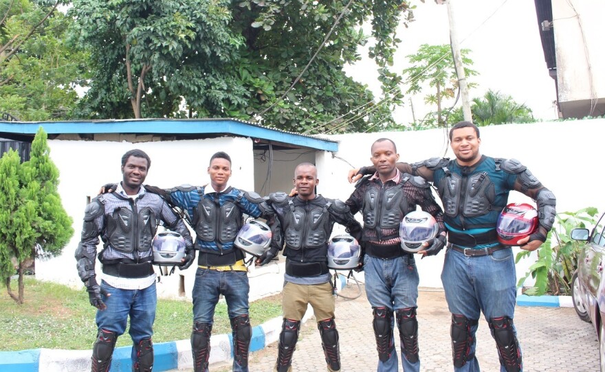 The drivers for Metro Africa Xpress get a good salary — and a cool uniform. People say the outfits make the drivers look like "RoboCop on the street."