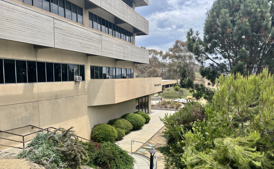 Window air conditioning units hang outside of Nierenberg Hall at the Scripps Institution of Oceanography campus, July 20, 2026.