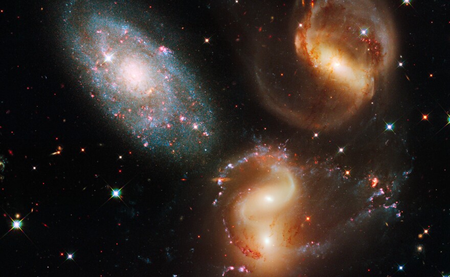 This image made by the NASA/ESA Hubble Space Telescope shows part of a group of five galaxies known as Stephan's Quintet.