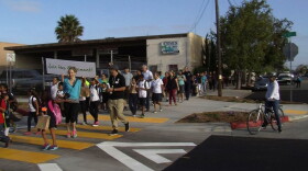 Students use a newly unveiled crosswalk near Kimball Elementary School in National City, Aug. 14, 2014.