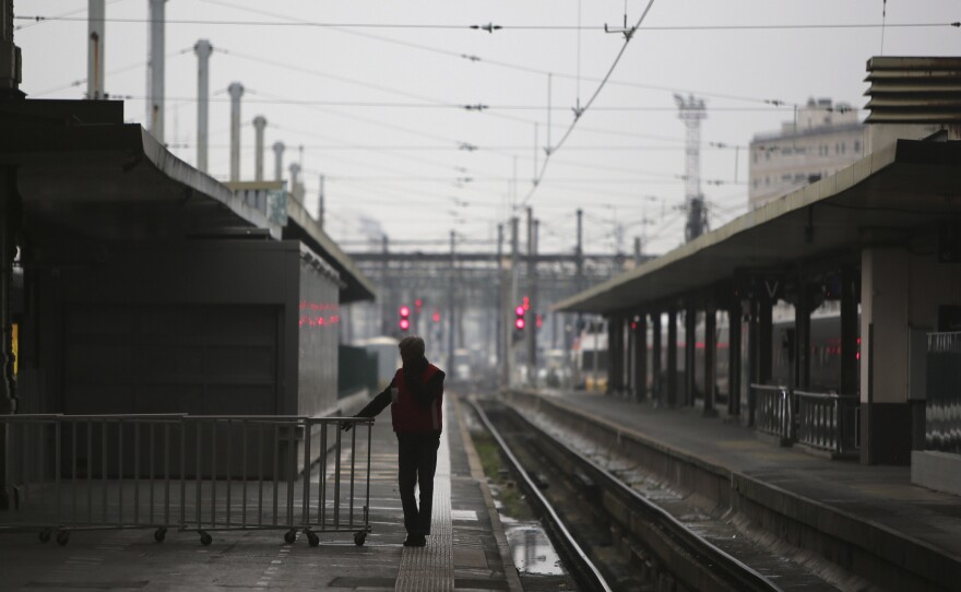 The Gare de Lyon railway station in Paris, typically brimming with busy travelers, stands empty Friday as general strikes snarled transportation across France for a second day.