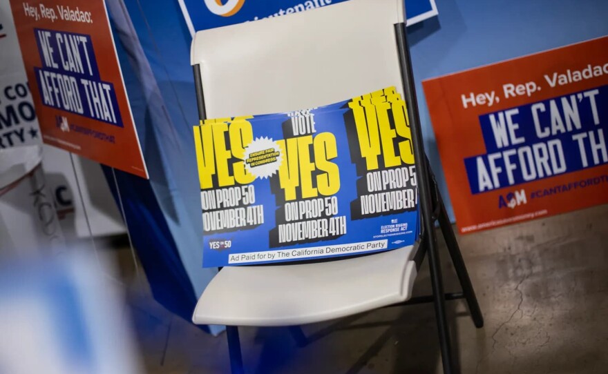 Fliers supporting Prop. 50 at the Kern County Democratic Party booth during the Kern County Fair in Bakersfield on Sept. 26, 2025.