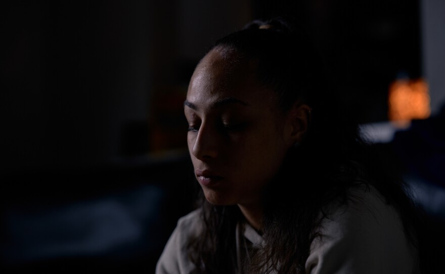 Portrait of Allyssa Lewis in her living room in Richardson, Texas, on April 4, 2022.