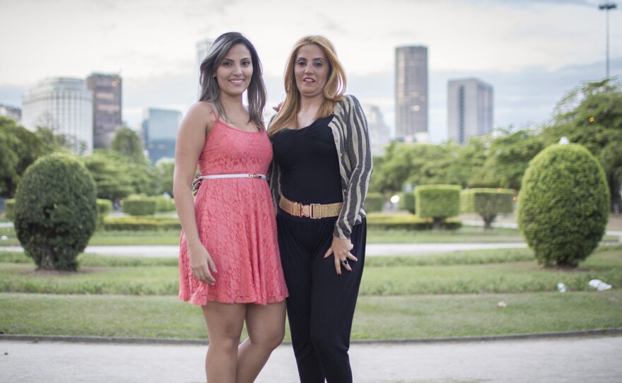 Janet Tamal, 47 (right), stands with her niece Thairine, 21. Janet has had a tummy tuck and a breast augmentation and helped her niece pay for liposuction. "The ideal is to be able to put something on, to sit down and not have your belly jumping out. Here in Brazil it gets hot, and the less clothes, the better," says Janet.