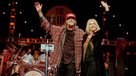 Every year, musician Neil Young and his wife Pegi (pictured on stage), organize the Bridge School Benefit Concert, an all-acoustic, nonprofit charity event held in October at Shoreline Amphitheatre in Mountain View, California.