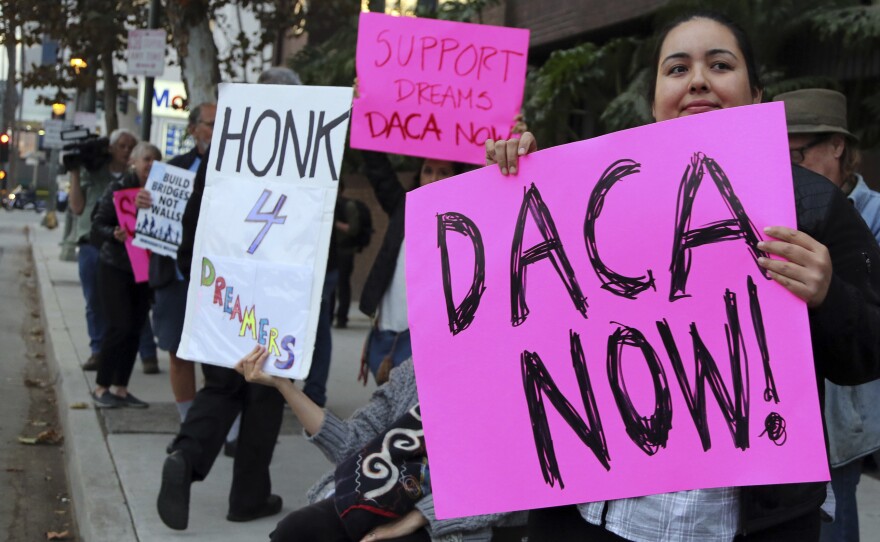 Demonstrators urging the Democratic Party to protect the Deferred Action for Childhood Arrivals Act (DACA) rally outside the office of California Democratic Sen. Dianne Feinstein in Los Angeles last week.