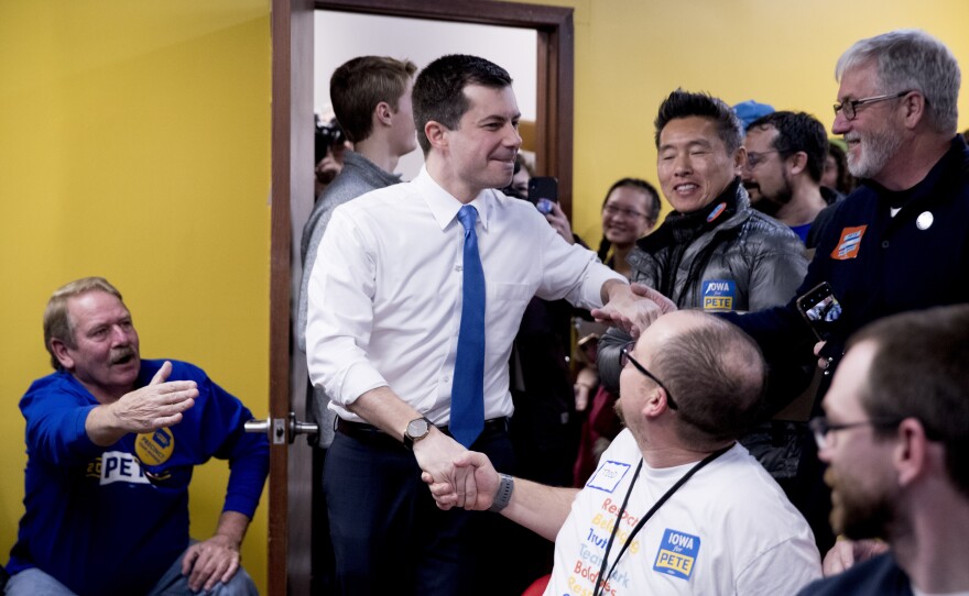 Former South Bend, Ind., Mayor Pete Buttigieg arrives to speak at a campaign office on Monday, in West Des Moines, Iowa.