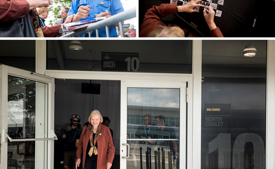 Janet Guthrie signs autographs during Legends Day at the Indianapolis Motor Speedway on Saturday.
