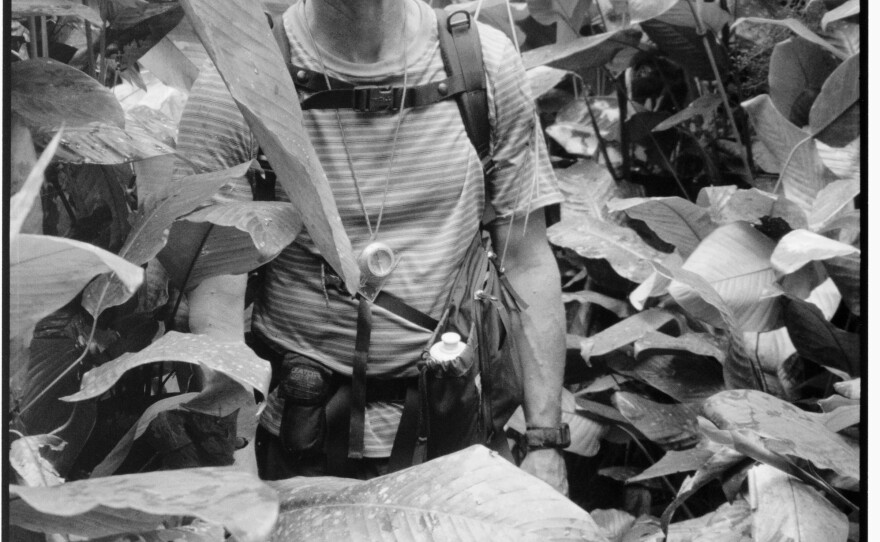 Science writer David Quammen treks through the jungle in the Republic of the Congo while traveling on the Megatransect Expedition in 2012.