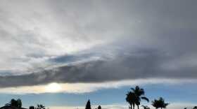 Clouds pass over homes in San Carlos, March 12, 2021.