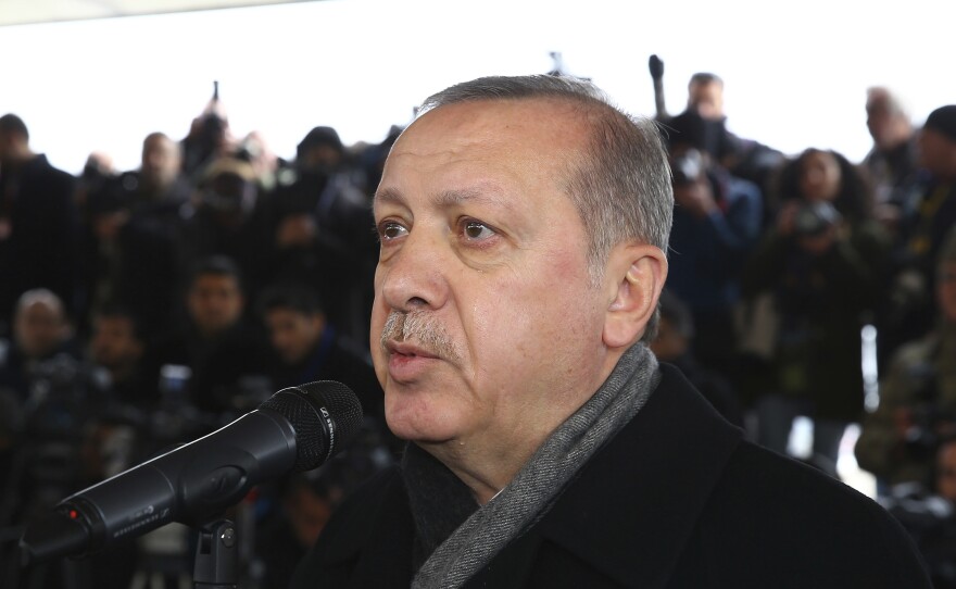 Turkey's President Recep Tayyip Erdogan speaks in Ankara during the funeral prayers for Sgt. Musa Ozalkan, the first Turkish soldier to be killed in Turkey's cross-border "Operation Olive Branch" in northern Syria, on Tuesday.