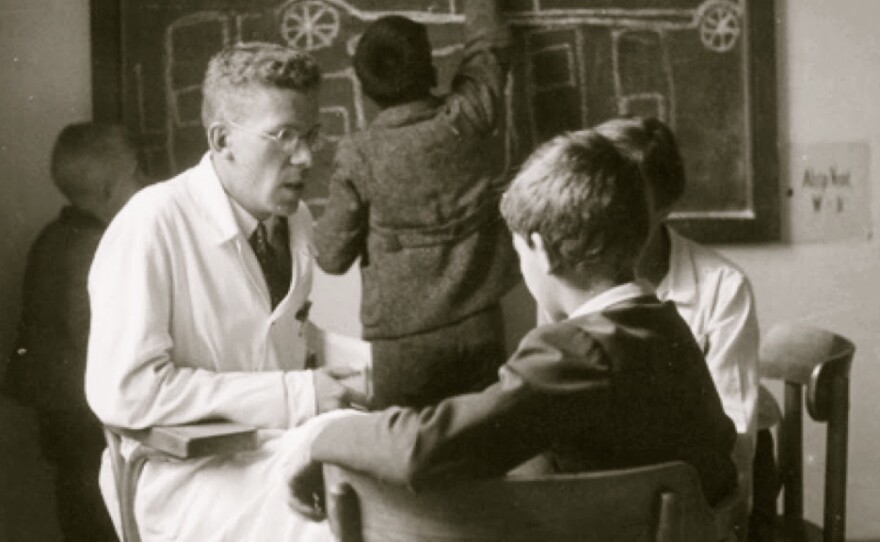 Dr. Hans Asperger with a young boy at the Children's Clinic at the University of Vienna in the 1930s.