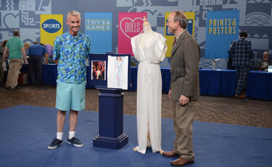 Steven Porterfield (right) appraises Brooke Shields's Bob Mackie beaded gown in Palm Springs, Calif.
