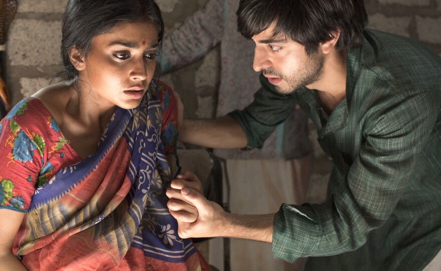 Parvati and Saleem (Shriya Saran and Satya Bhabha), born in tandem at the birth of independent India, are at the center of Salman Rushdie's novel <em>Midnight's Children. </em>Thirty years after the book's publication,<em> </em>filmmaker Deepa Mehta has committed the story to the big screen.