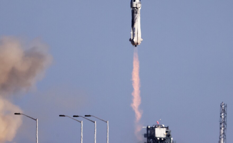 Blue Origin's New Shepard lifts off from the launch pad carrying 90-year-old Star Trek actor William Shatner and three other civilians near Van Horn, Texas.