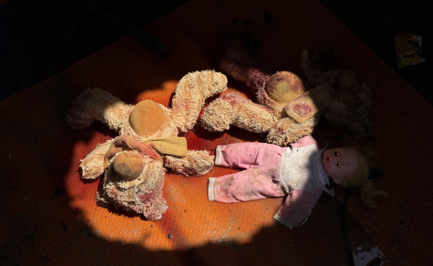 A child's toys are stained with blood in Gaza City on Sept. 1, 2026, following an Israeli operation to kidnap a Hamas security officer. His family was killed in Israeli airstrikes.