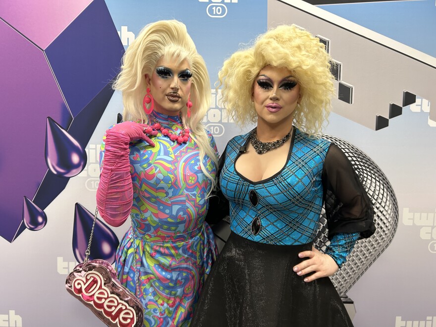 Drag performers Deere (left) and DragTrashly pose at TwitchCon at the San Diego Convention Center. Oct. 17, 2025.