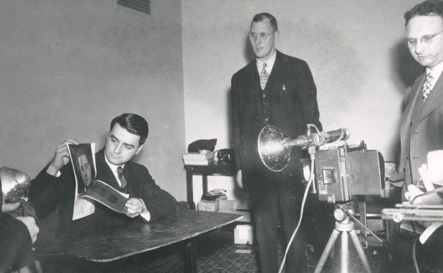 Edwin Land demonstrating the Land Camera for the Optical Society of America. April 1947.