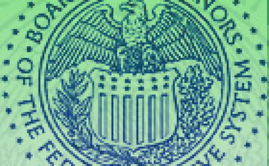 Fed chairman says a spike in inflation could bring a quick rise in lending rates.