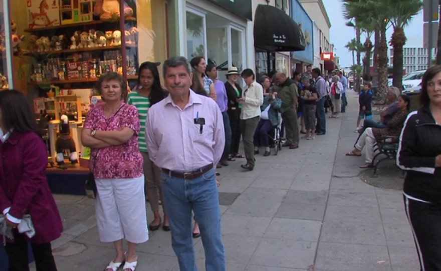 Dozens of people lined up outside Warwick's Books in La Jolla, where former Secretary of State Hillary Clinton was set to hold a book signing for her new book "Hard Choices,"  June 25, 2014. 