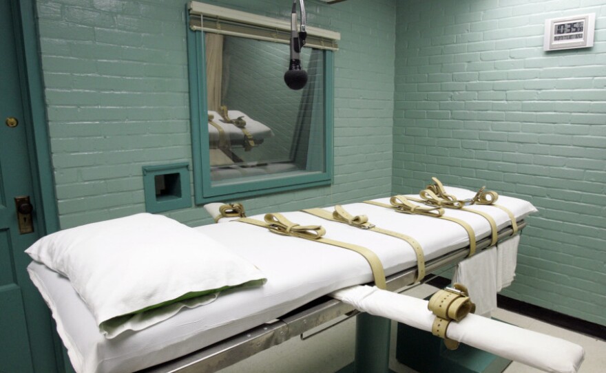 <p>A microphone hangs over the gurney in the Texas death house in 2008 in Huntsville, Texas. </p>
