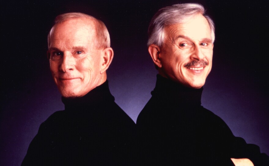 Tom and Dick Smothers host “This Land Is Your Land," a musical journey through the evolution of modern American folk music.