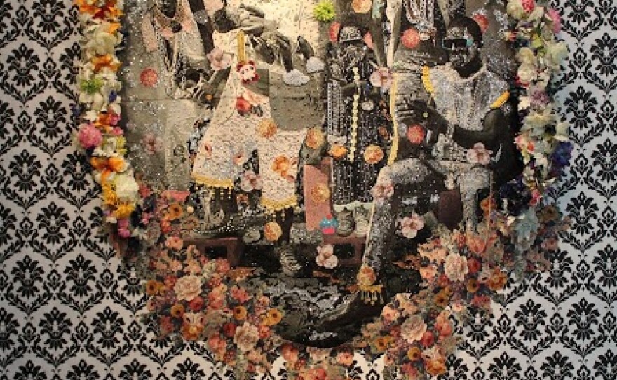 A mixed media wall tapestry by Ebony Patterson on view at Lux Art Institute. It's titled "Wi Oh So Clean," 2012.