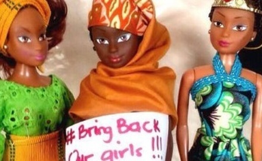 On the company's website, three of the dolls are shown holding a #BringBackOurGirls sign — another marker of the company's focus on social responsibility.