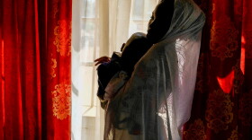 Salamatu Umar, who was forced to marry a Boko Haram fighter, holds son Usman Abubakar.