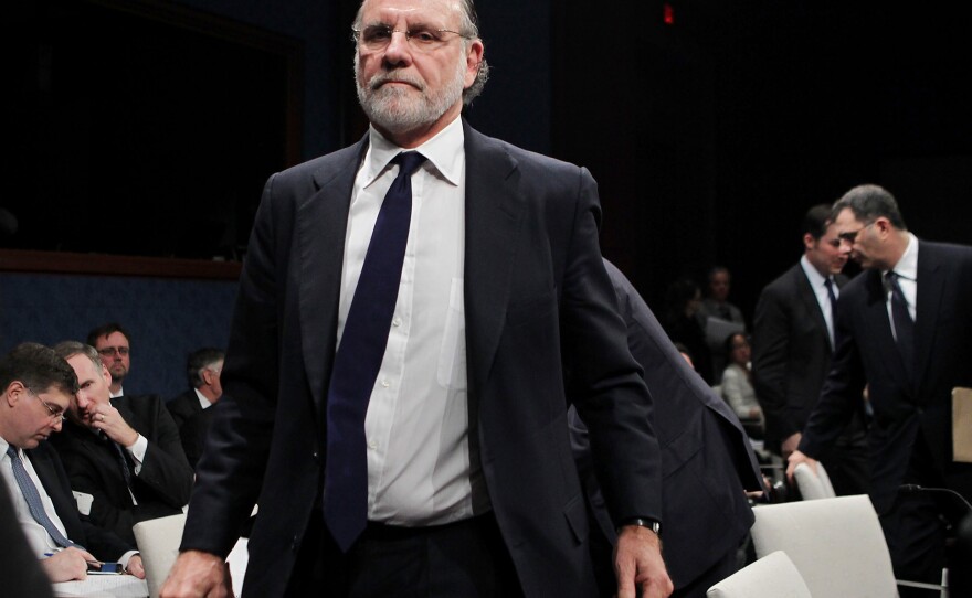 Former New Jersey governor and ex-CEO of MF Global Jon Corzine leaves a congressional hearing in Dec. 2011.
