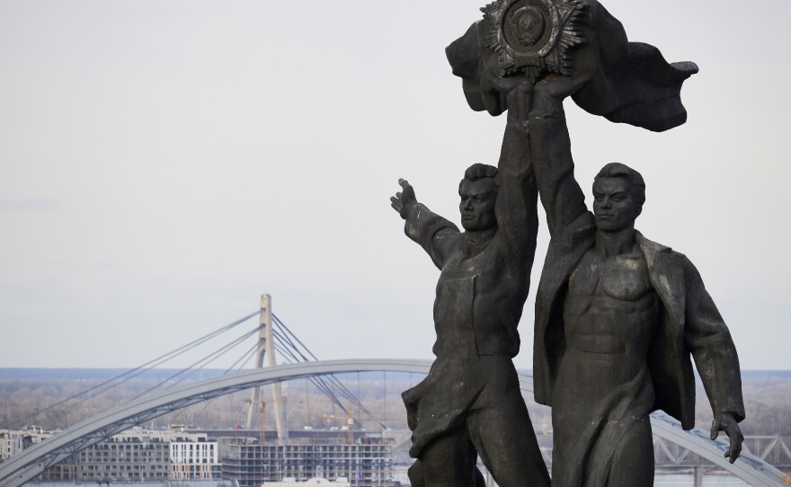 Ukraine is calling upon reservists to return to active duty in response to a looming threat of Russian invasion. Here, the People Friendship Arch is seen in Kyiv — a landmark that has stirred controversy over the years, because it was installed in 1982 by the old Soviet government.
