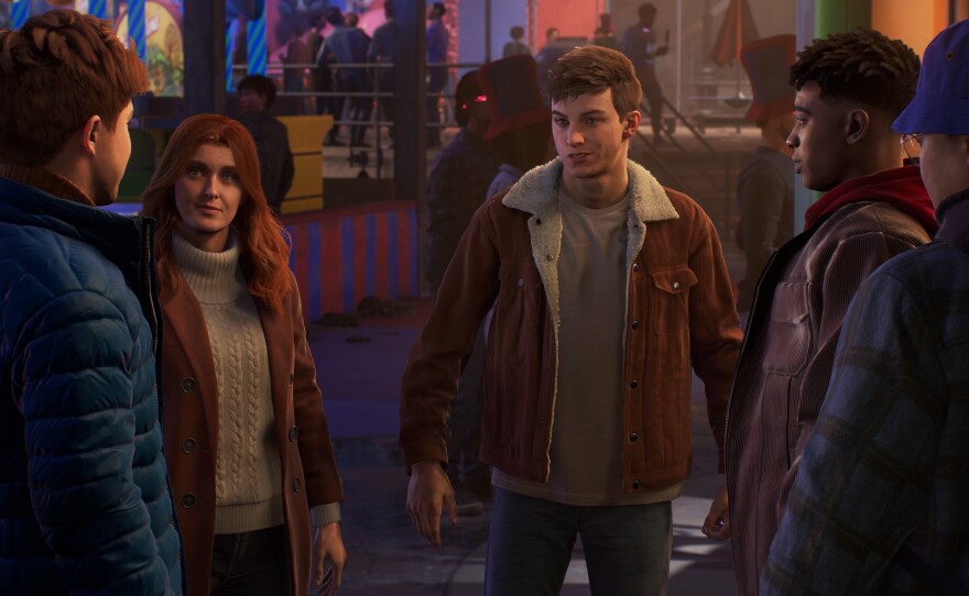 Peter Parker and Miles Morales confer with their allies.