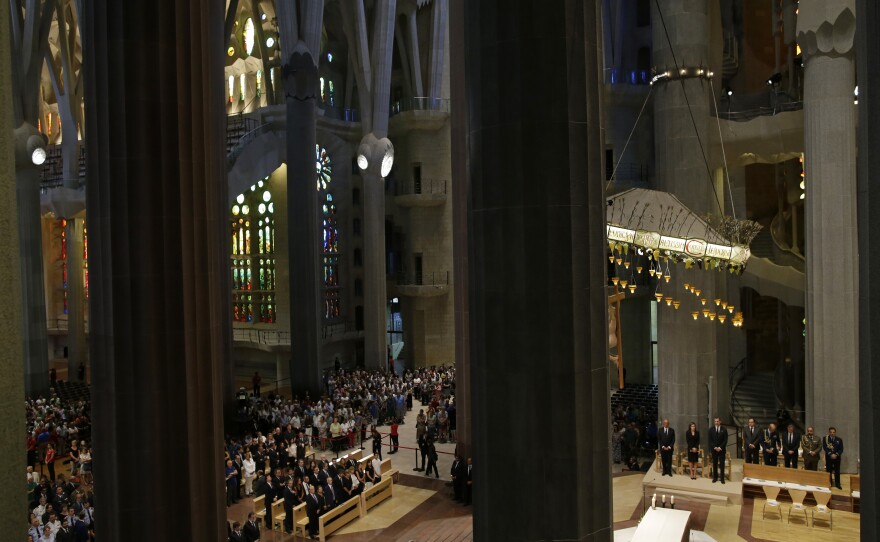 Spain's King Felipe and Queen Letizia and other dignitaries attend a solemn Mass at Barcelona's Sagrada Familia Basilica on Sunday for the victims of the terror attacks that killed 14 people and wounded over 120 in Barcelona, Spain.